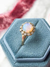 14k Vintage Opal with 0.15cttw Diamond Halo Ring